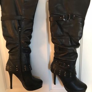 Black leather knee high boots